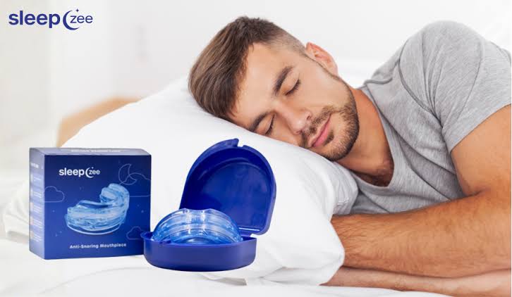 Sleeper resting beside a Sleepzee product kit